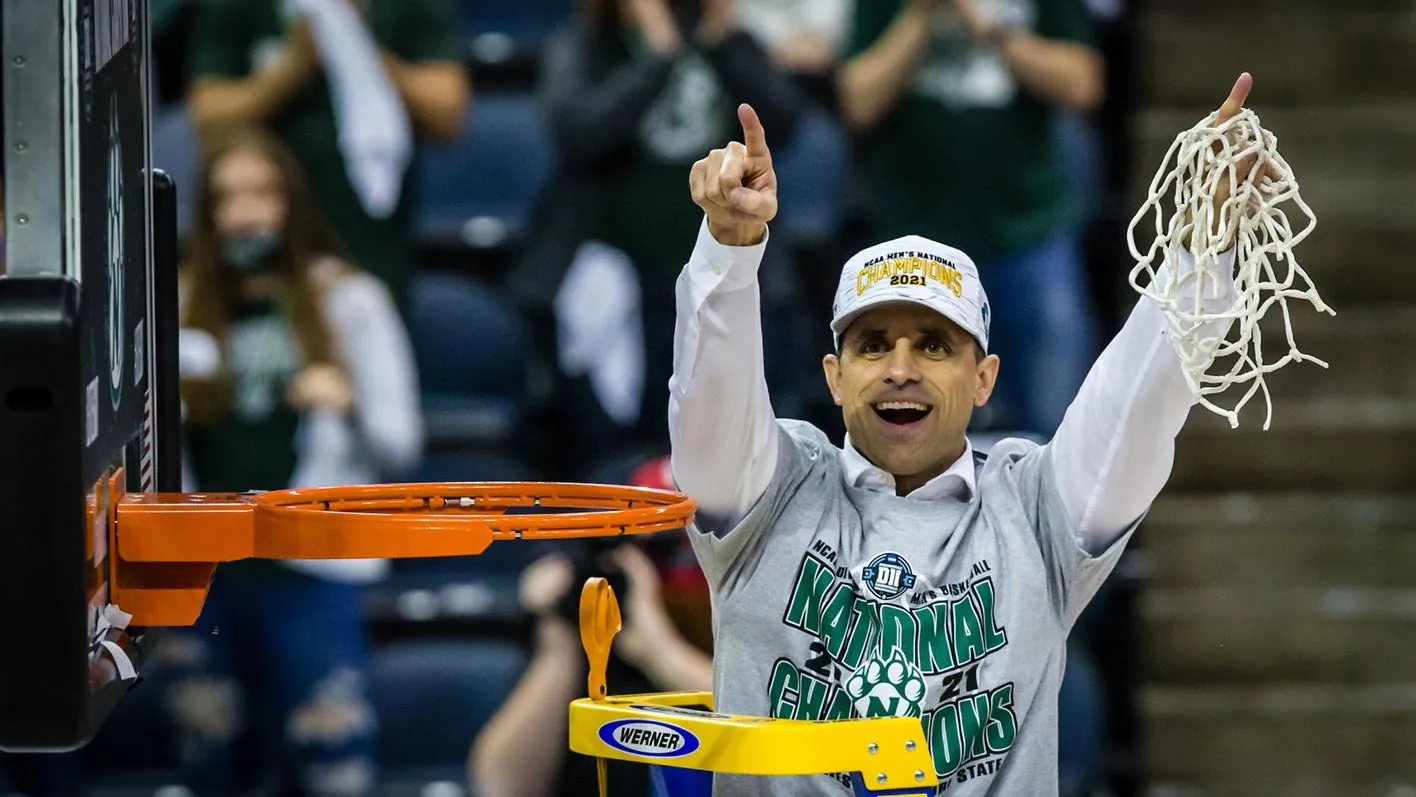 Coach McCollum celebrates after championship