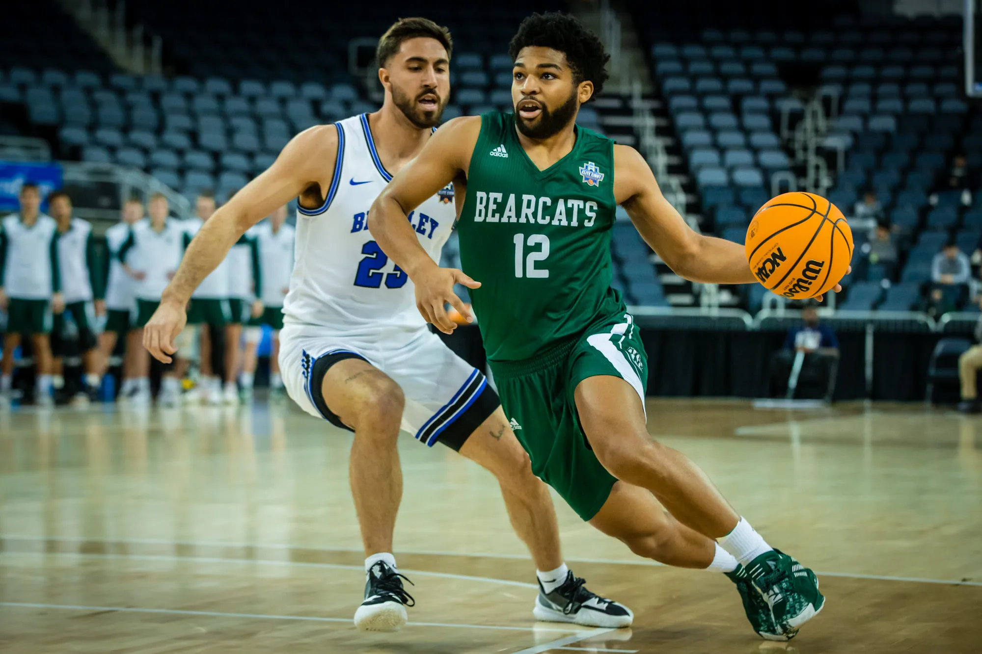 Trevor Hudgins driving to the rim